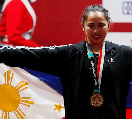 Hidilyn Diaz wins first ever Olympic gold for the Philippines in Weightlifting