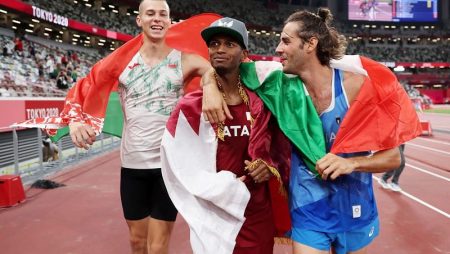 Mutaz Essa Barshim and Gianmarco Tamberi celebrate after winning gold