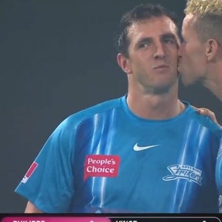 “Love Is In The Air”: Peter Siddle, kisses a teammate during a Big Bash League match.