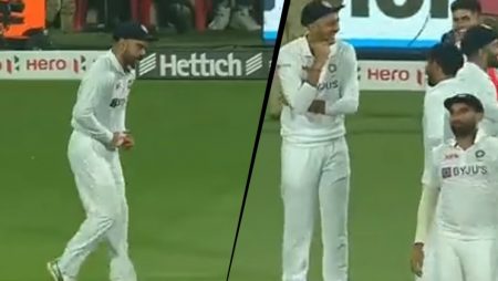Virat Kohli attempts to imitate Jasprit Bumrah’s bowling action.