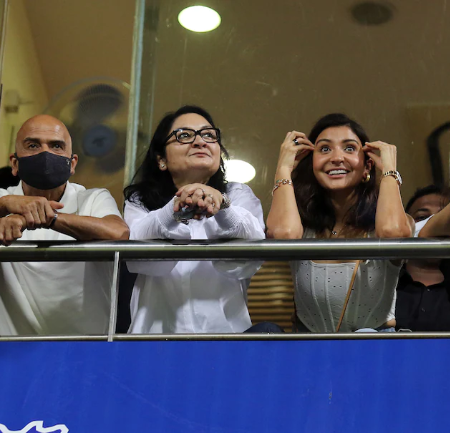 After a stunning one-handed catch to dismiss Rishabh Pant, Virat Kohli waves to wife Anushka Sharma.