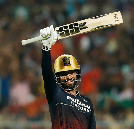 Rajat Patidar hits a six to reach a century in the IPL 2022 Eliminator.